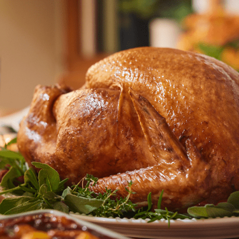 A prepared Butterball Cook from Frozen turkey on a set table.