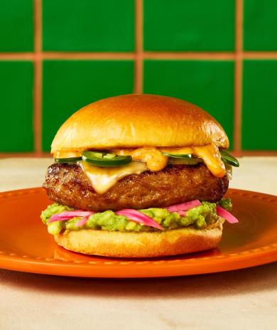A Butterball Tex-Mex ground turkey burger with jalepenos, melted cheese, and guacamole.