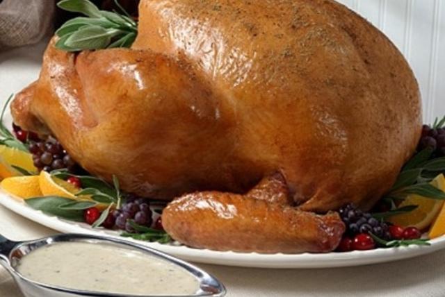 Image of Roasted Turkey with Mushroom Herb Sauce